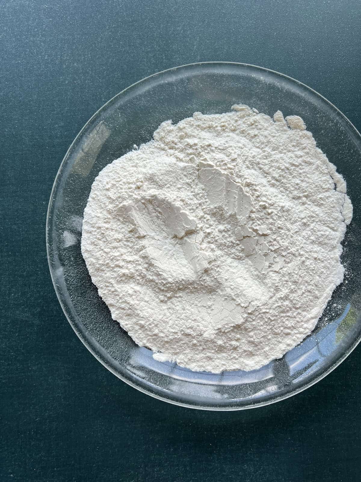 a plate with plain flour on it
