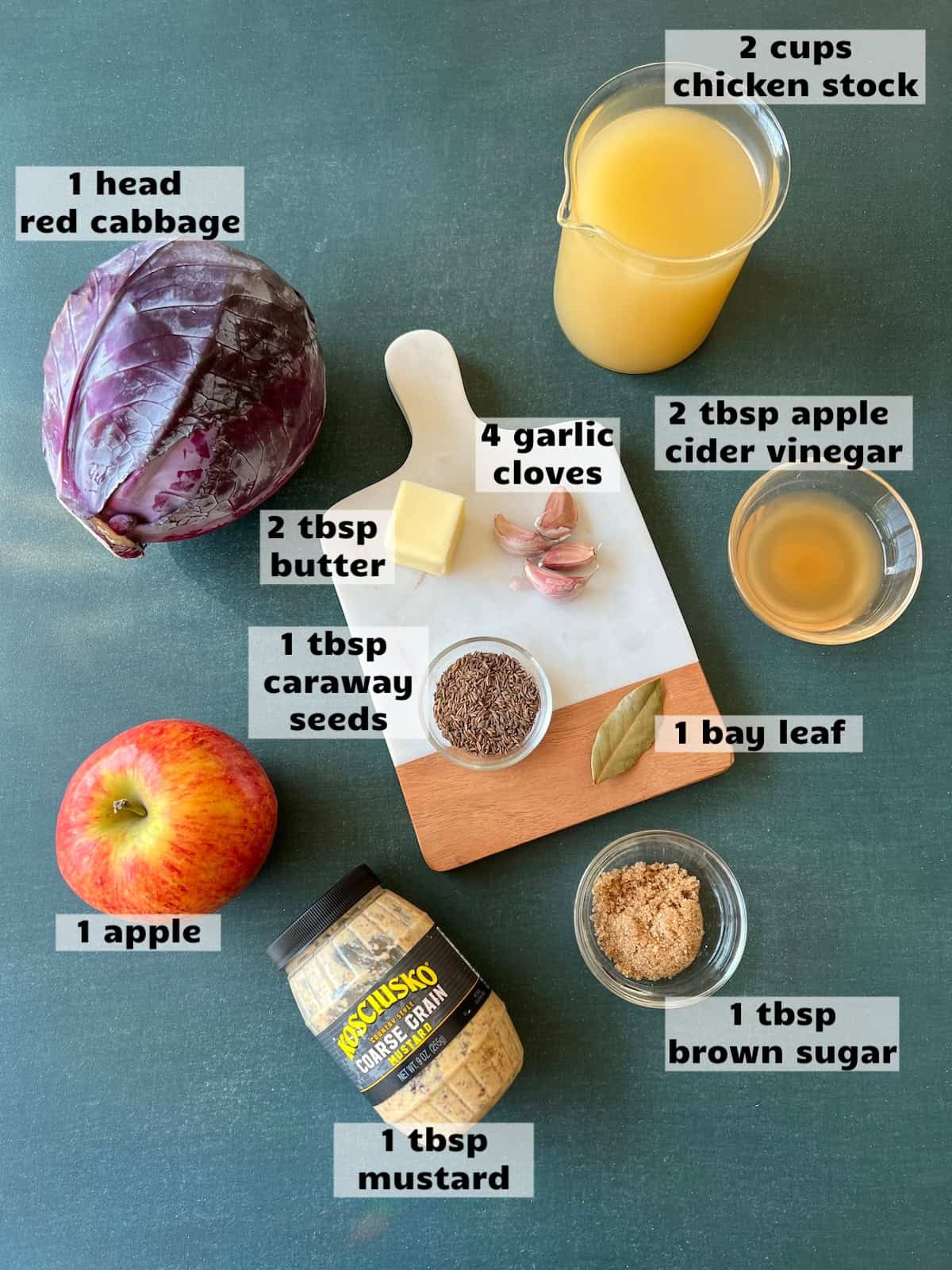 all of the ingredients needed to make this sauteed red cabbage recipe are laid out on a work surface and labeled