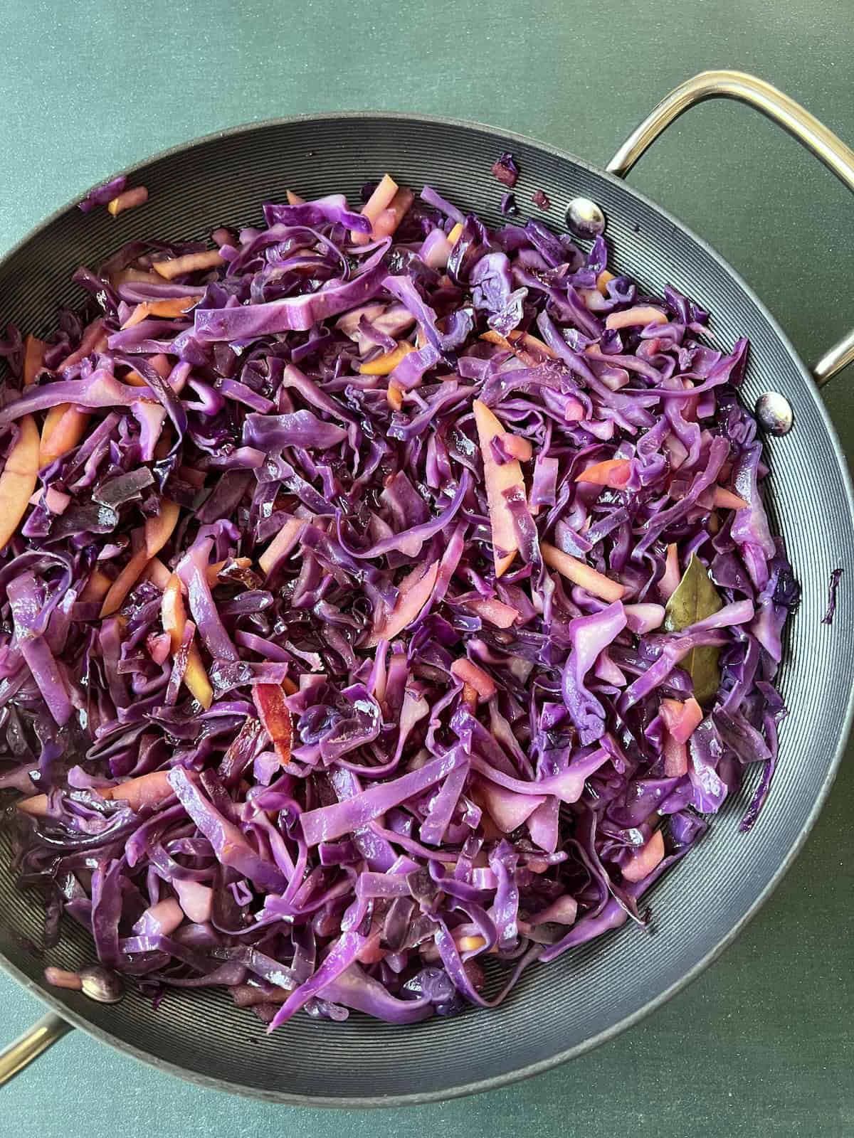 the cabbage mixture in the skillet has softened in texture and reduced in size