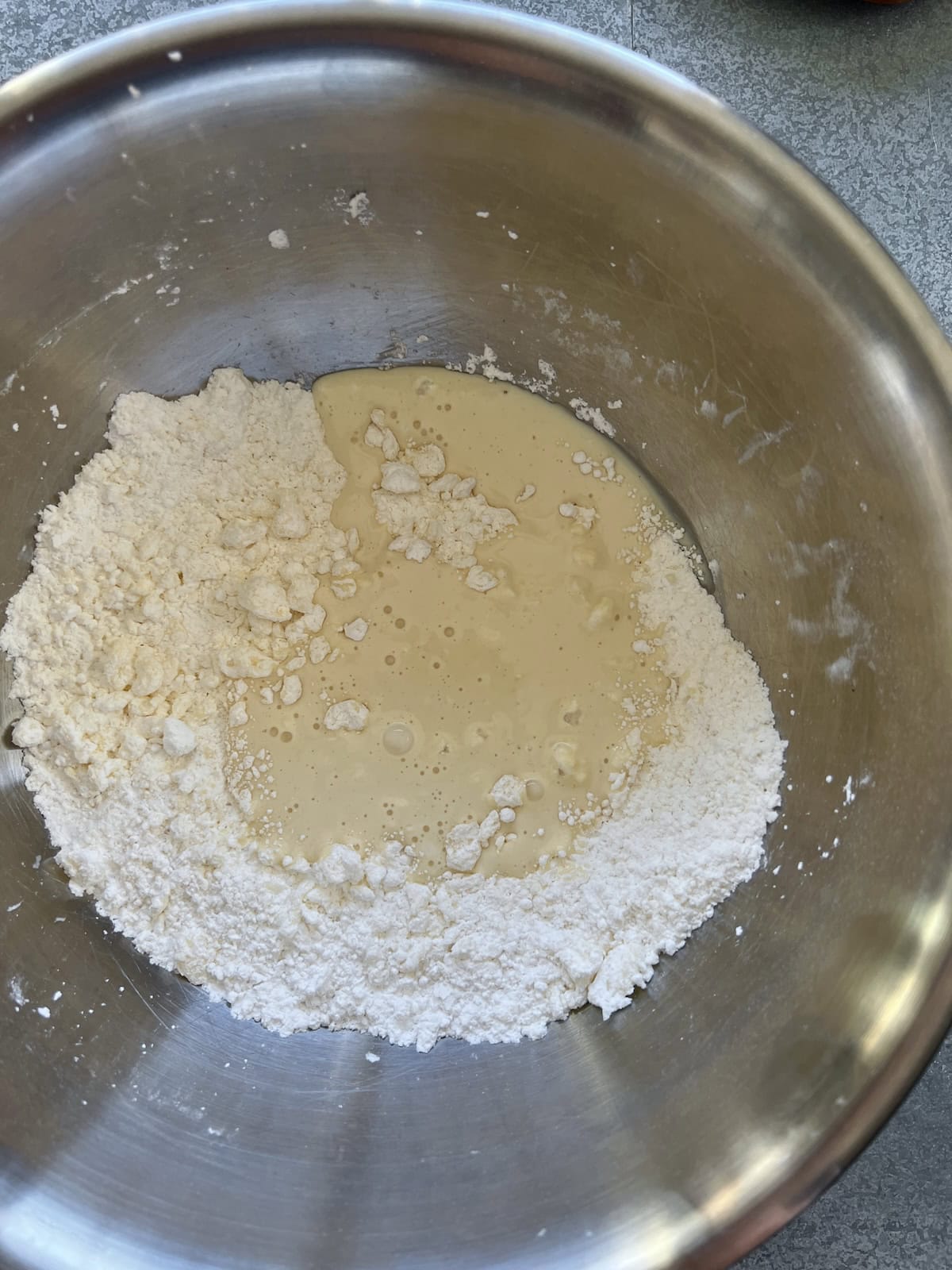 powdered sugar and eggnog are combined in a mixing bowl