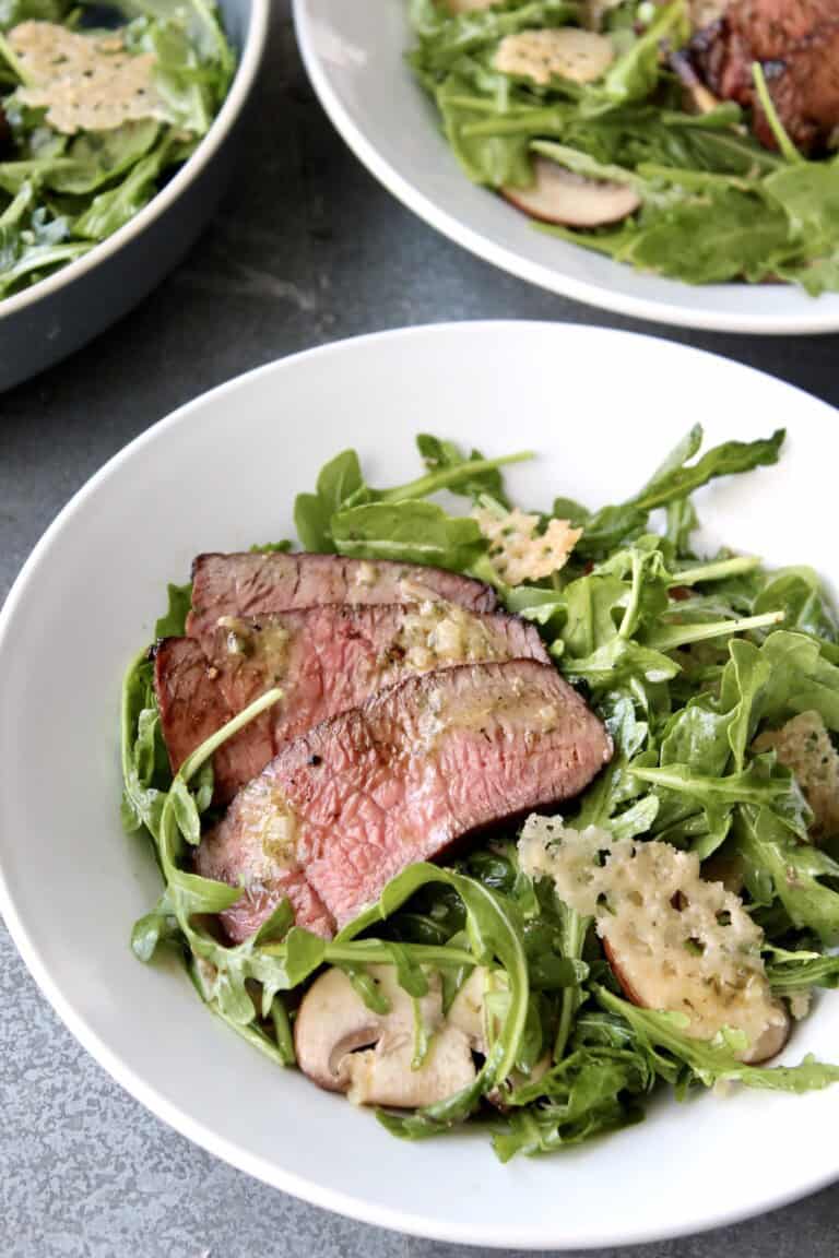 arugula steak salad with parmesan crisps