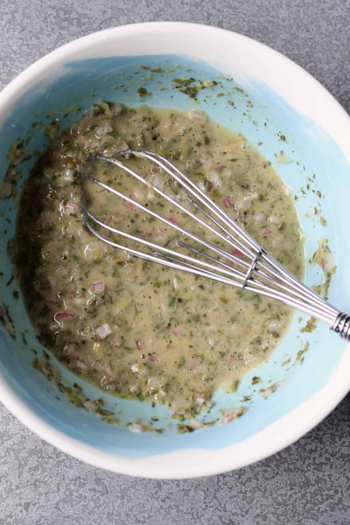 the dressing ingredients are whisked together